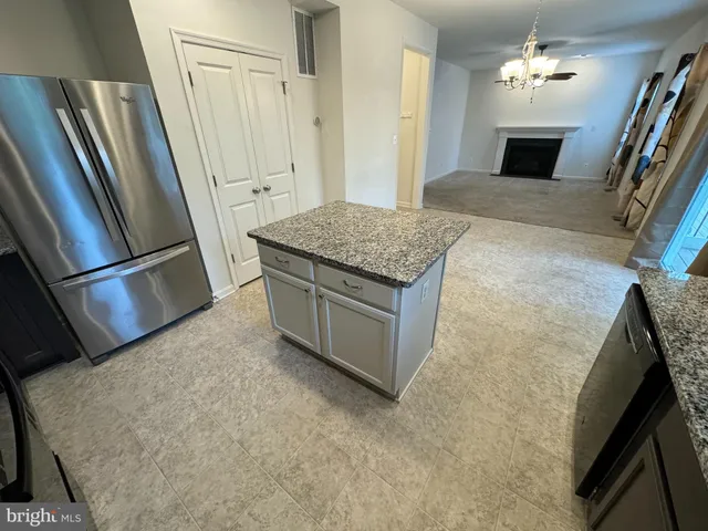a view of kitchen and hallway