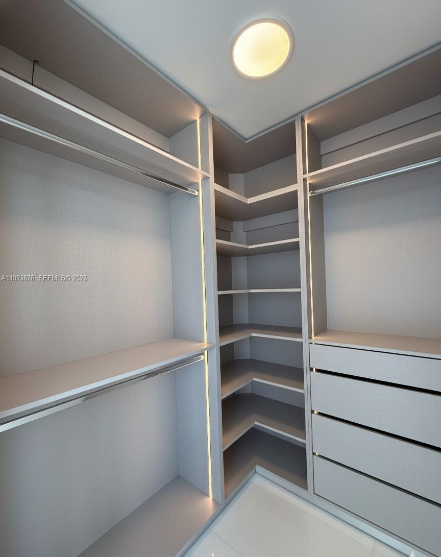 300 Biscayne Blvd Way, Unit 4201 Miami, FL 33131 - Photo 12 of 21 a view of an empty walk in closet