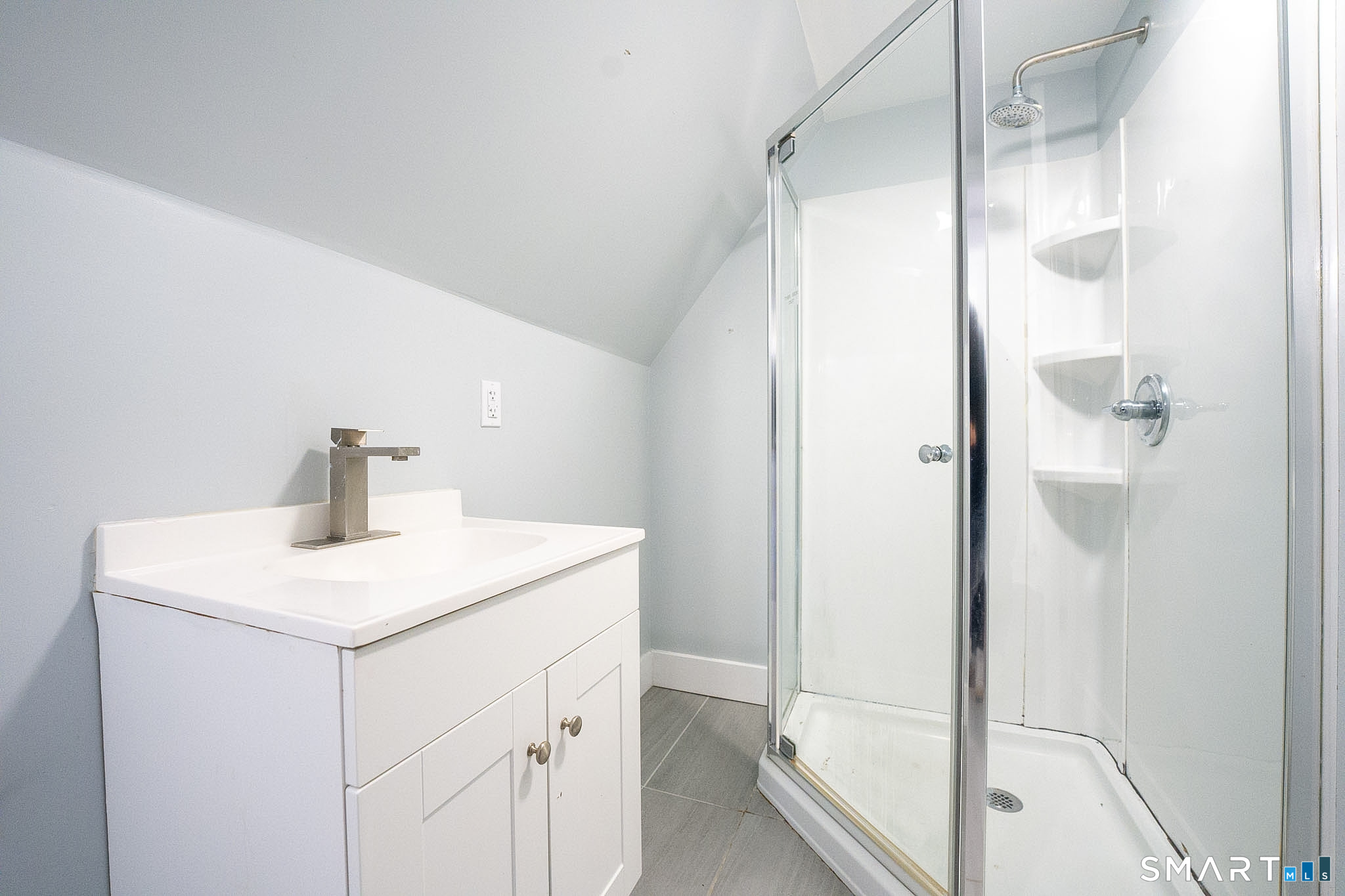 121 Hawthorne Avenue Derby, CT 06418 - Photo 12 of 12 a bathroom with a sink and mirror