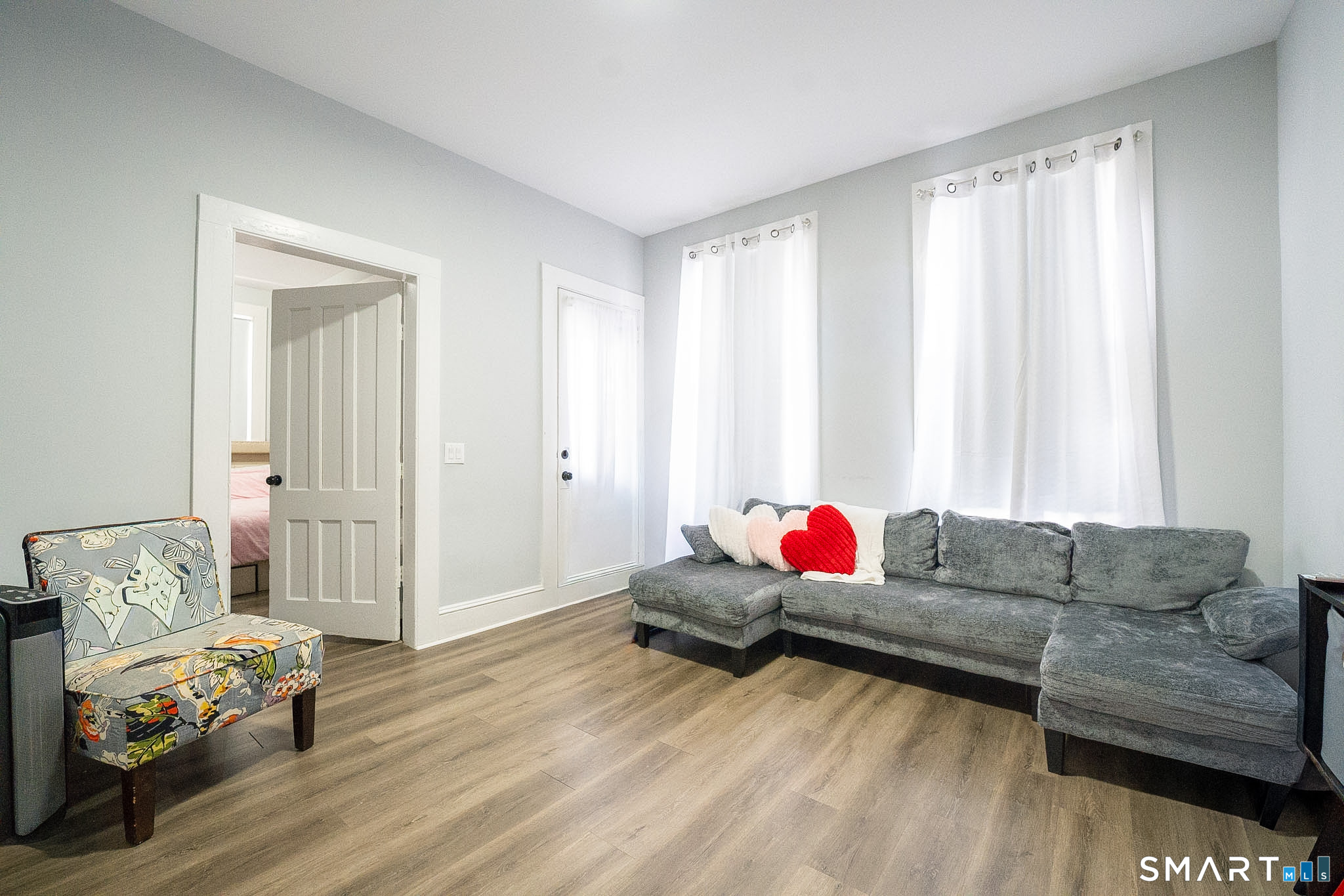 121 Hawthorne Avenue Derby, CT 06418 - Photo 6 of 12 a living room with furniture and a couch