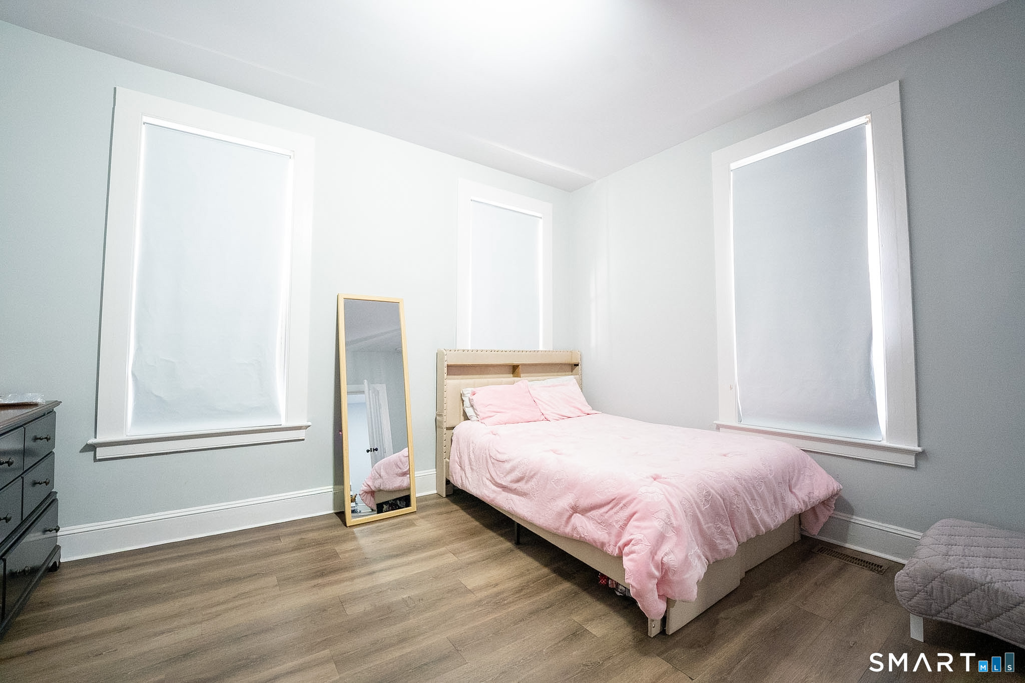 121 Hawthorne Avenue Derby, CT 06418 - Photo 7 of 12 a bedroom with a bed and a window