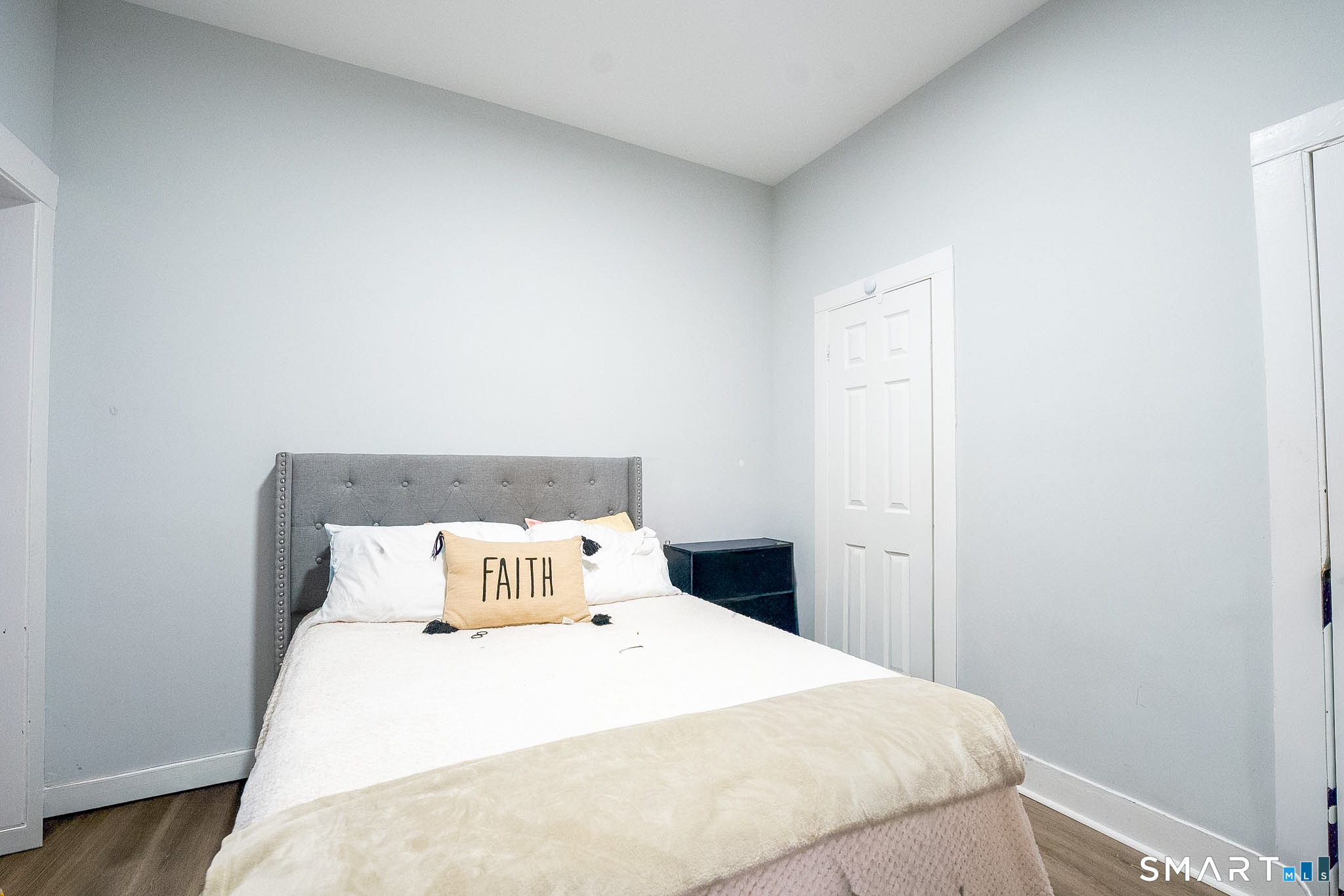 121 Hawthorne Avenue Derby, CT 06418 - Photo 8 of 12 a bedroom with a bed and window