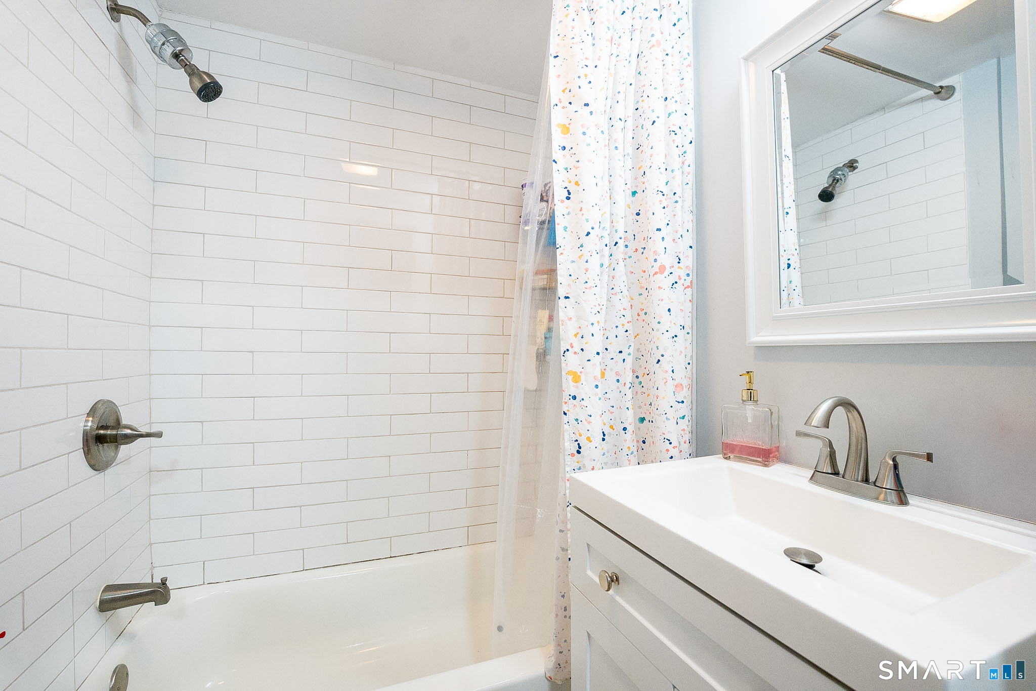 121 Hawthorne Avenue Derby, CT 06418 - Photo 10 of 12 a bathroom with a sink and shower