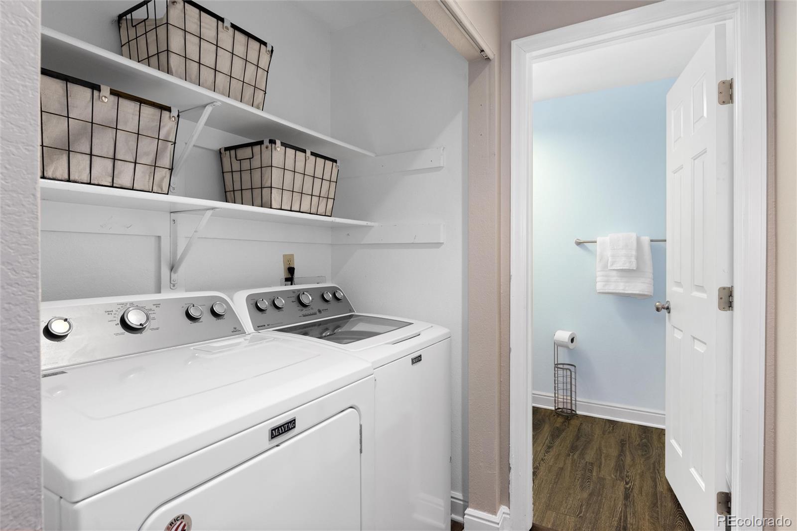 1225 East Goldsmith Drive Highlands Ranch, CO 80126 - Photo 21 of 40 a view of utility room with washer and dryer