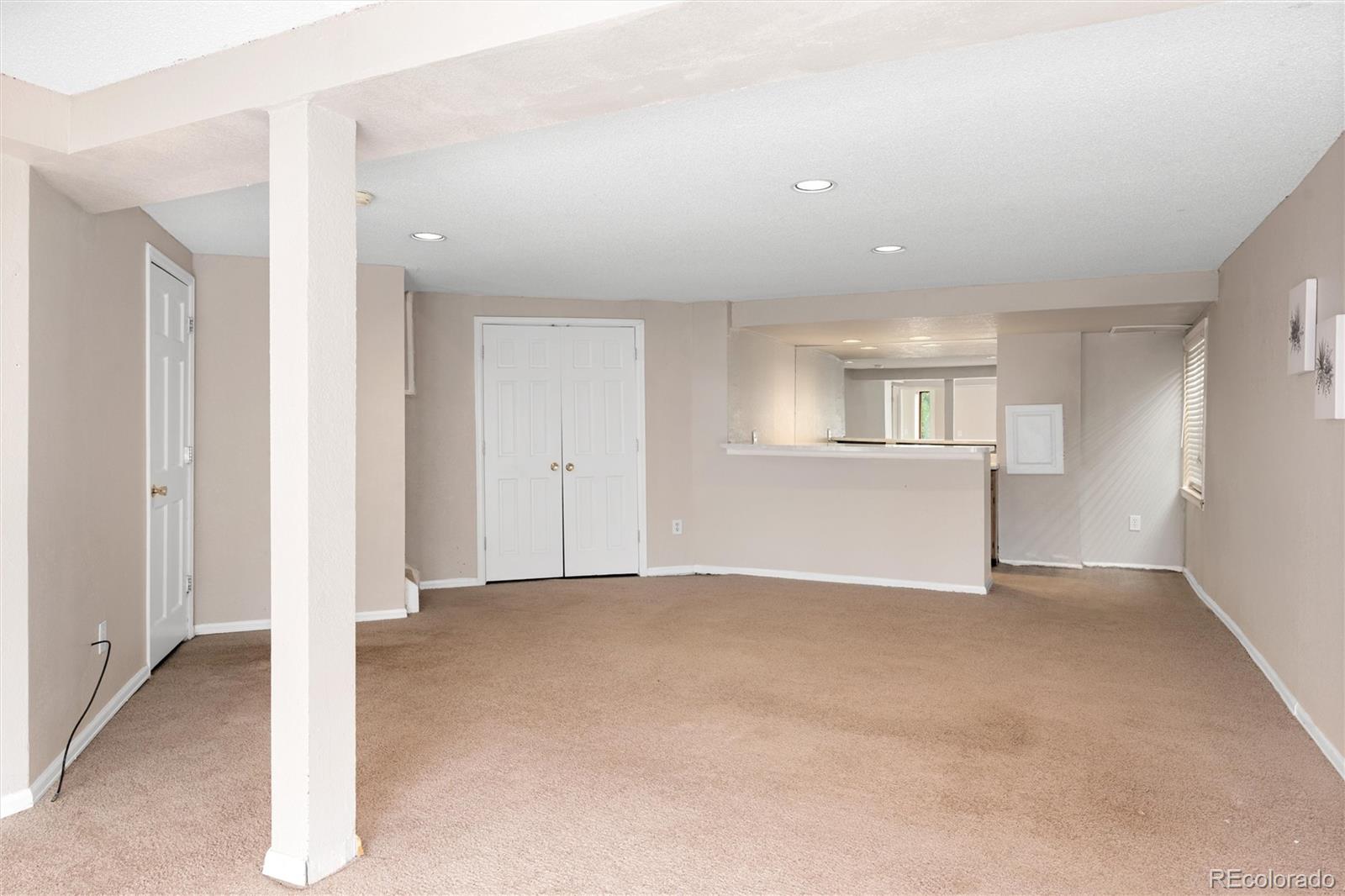 1225 East Goldsmith Drive Highlands Ranch, CO 80126 - Photo 31 of 40 a view of an empty room with a window