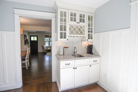 a view of kitchen with wooden floor