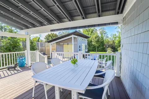 a view of a table and chairs in patio