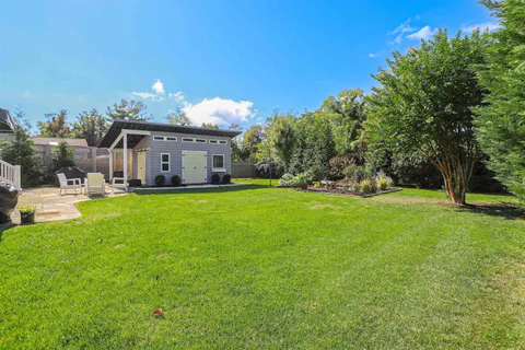 a view of a house with a big yard