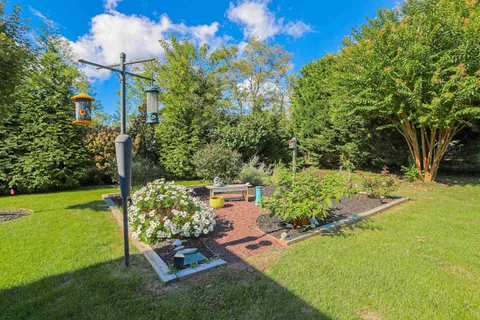 a view of a golf club with a backyard