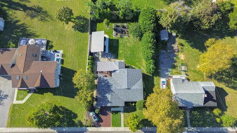 a front view of a building with street view