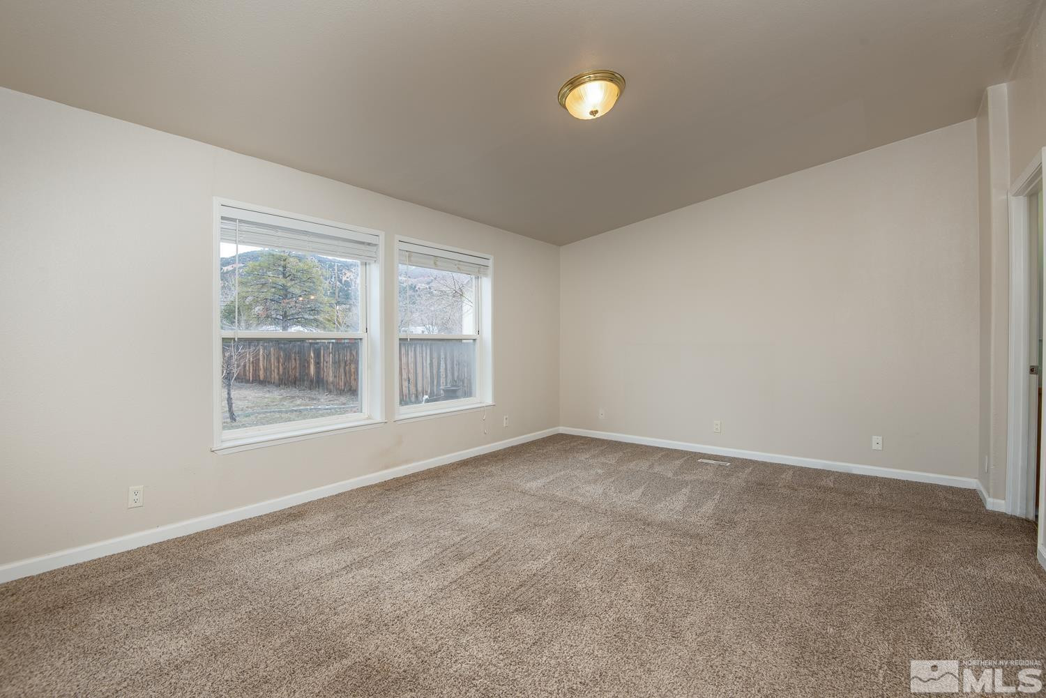 15485 Toll Road Reno, NV 89521 - Photo 13 of 29 an empty room with a window
