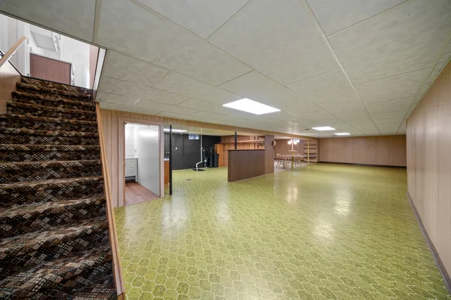 a view of a swimming pool and an empty room