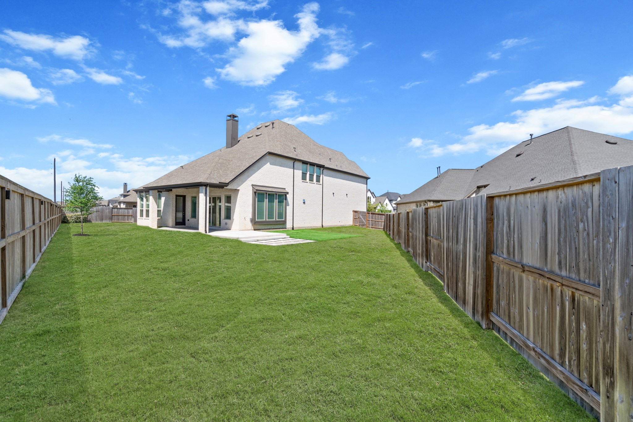 7303 Compass Drive Katy, TX 77493 - Photo 27 of 31 a view of an house with backyard and entertaining space