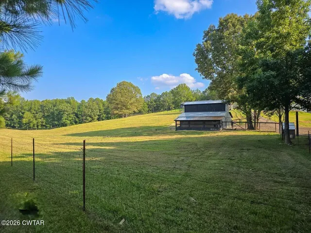 a view of outdoor space and yard