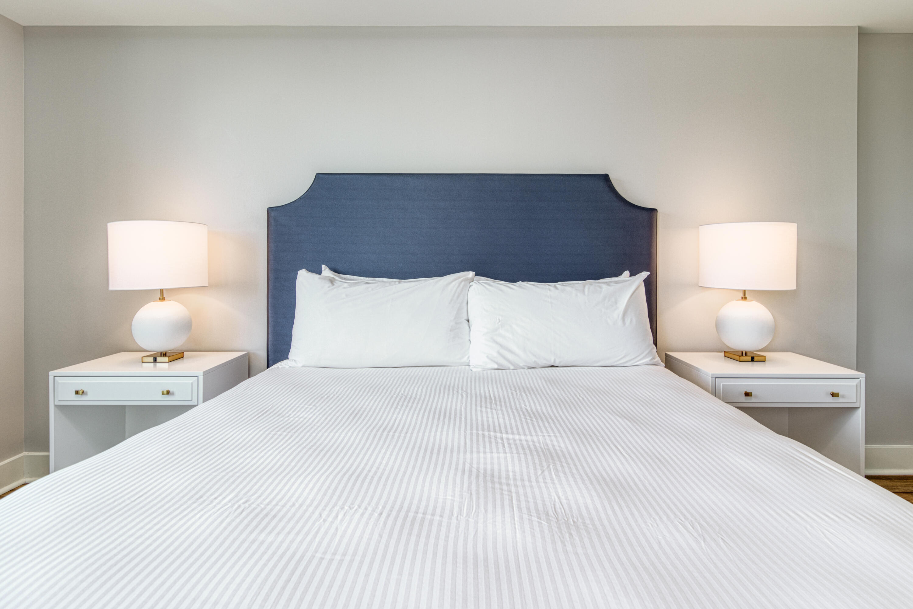 9000 Heron Walk Drive, Unit 3104 Miramar Beach, FL 32550 - Photo 16 of 45 a bedroom with a bed and a lamp