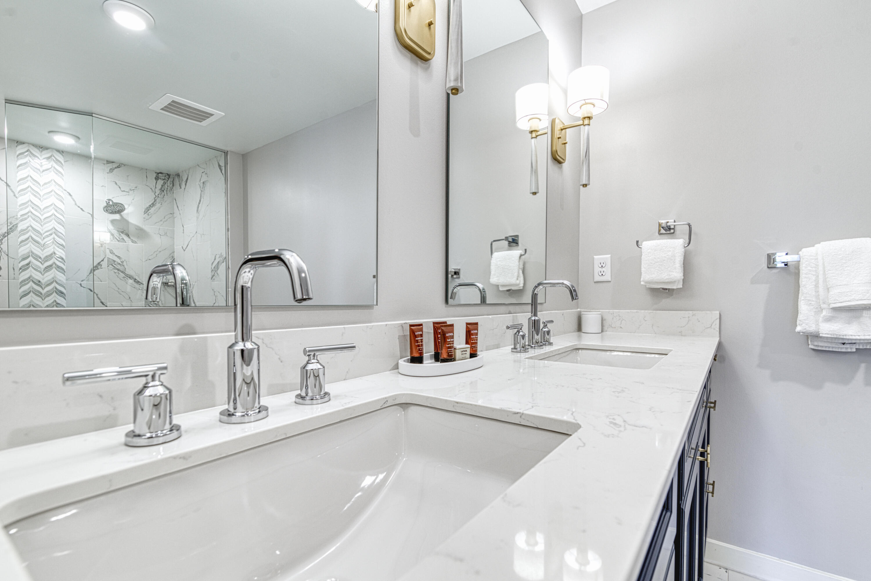 9000 Heron Walk Drive, Unit 3104 Miramar Beach, FL 32550 - Photo 21 of 45 a bathroom with double vanity sinks and a mirror