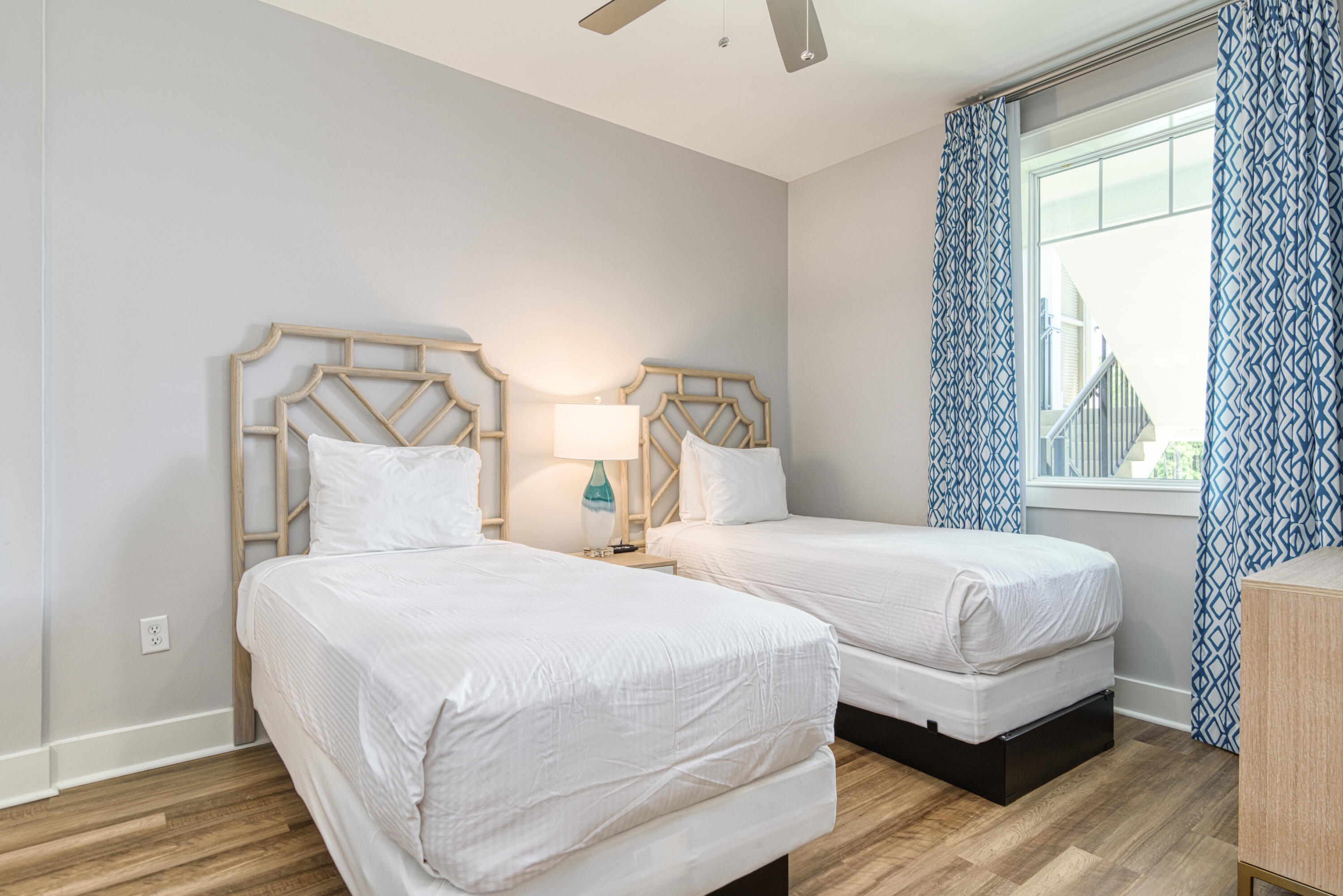 9000 Heron Walk Drive, Unit 3104 Miramar Beach, FL 32550 - Photo 25 of 45 a bedroom with a bed and wooden floor