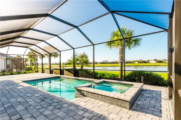 a view of swimming pool with a patio