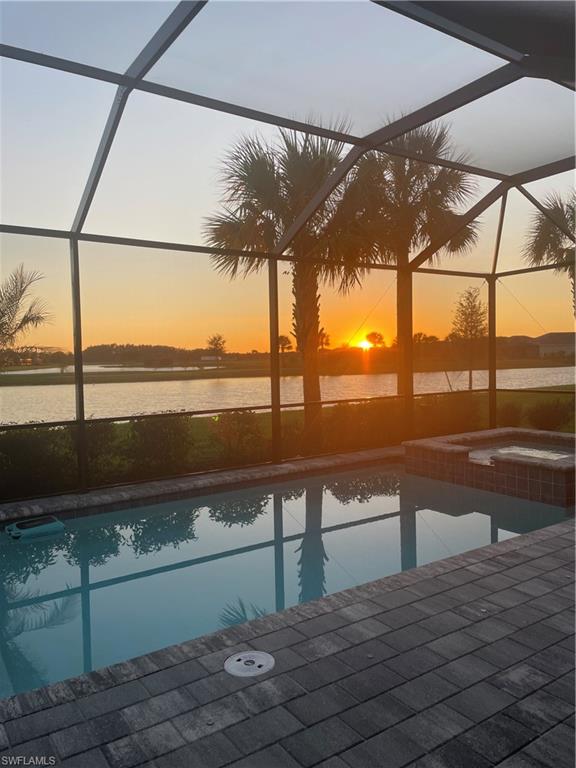 5423 Ternberry Road Ave Maria, FL 34142 - Photo 20 of 46 a view of ocean from a balcony