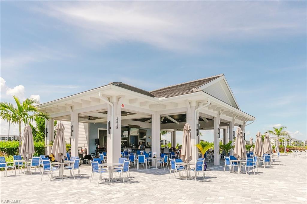 5423 Ternberry Road Ave Maria, FL 34142 - Photo 34 of 46 a view of a building with a patio