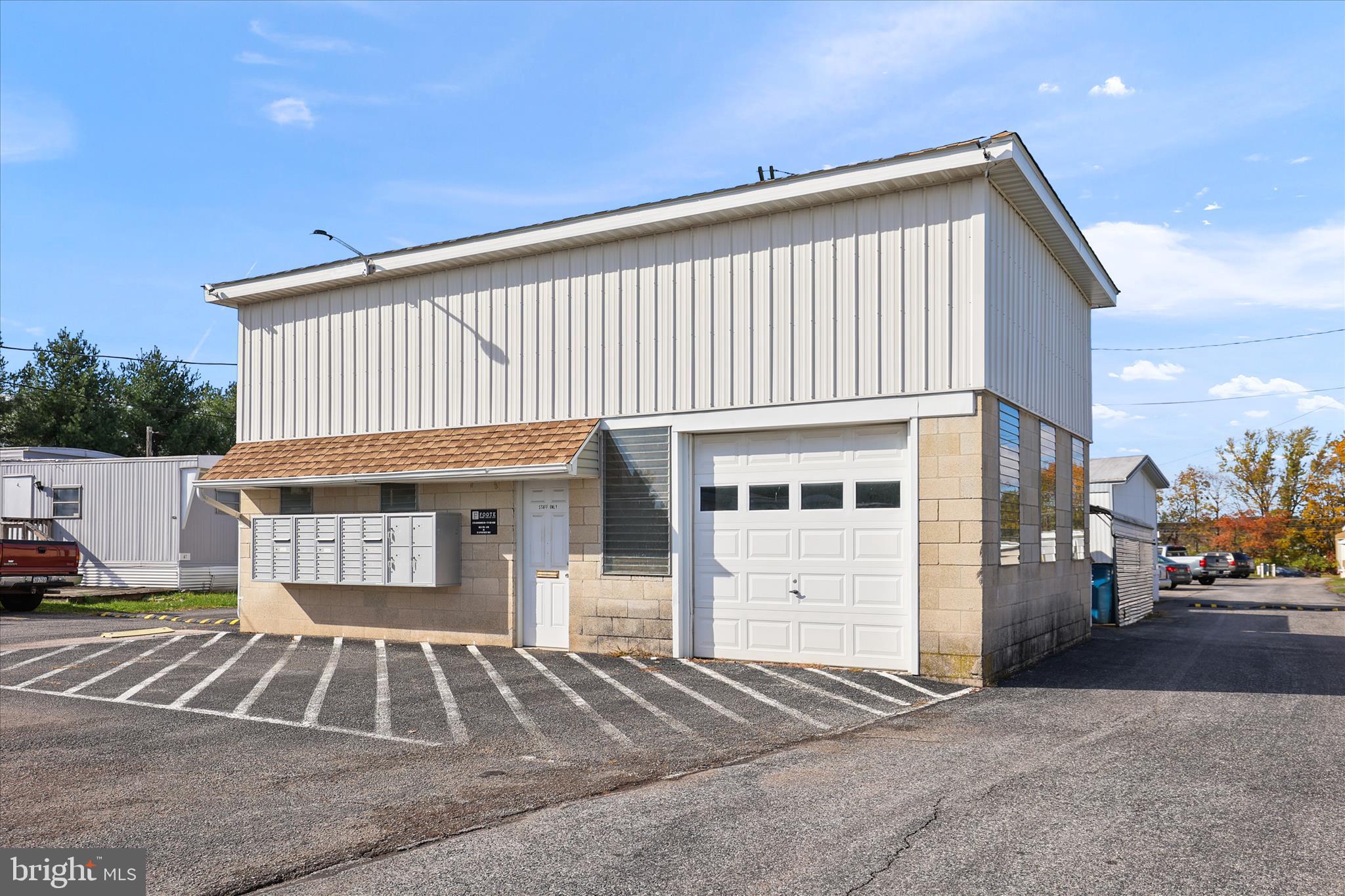 3720 Davidsburg Road, Unit A12 Dover, PA 17315 - Photo 15 of 32 a front view of a house with a yard