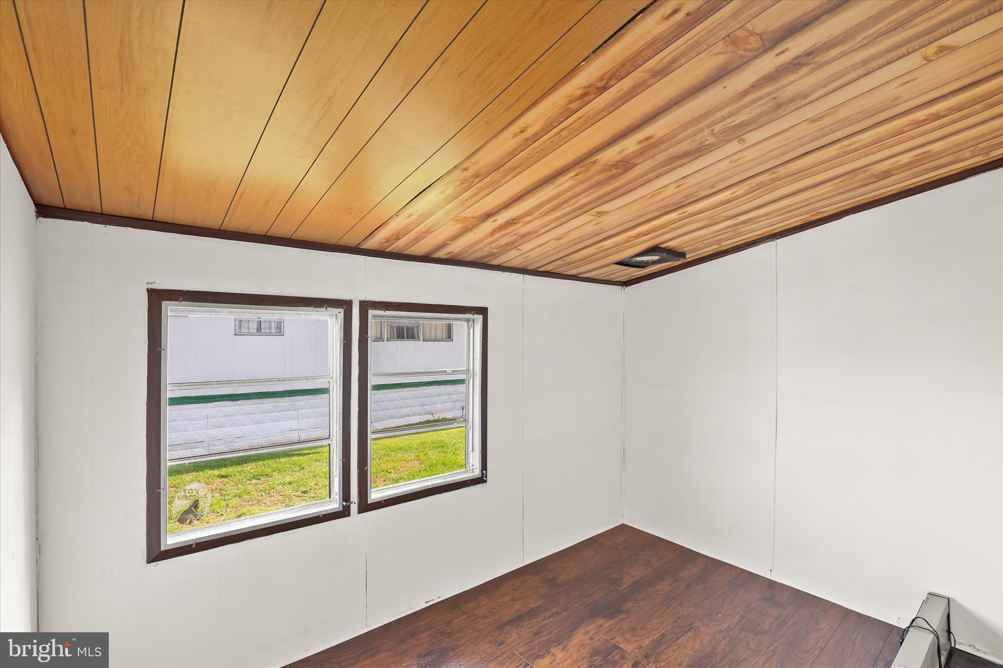 3720 Davidsburg Road, Unit A12 Dover, PA 17315 - Photo 23 of 32 a view of an empty room with a window