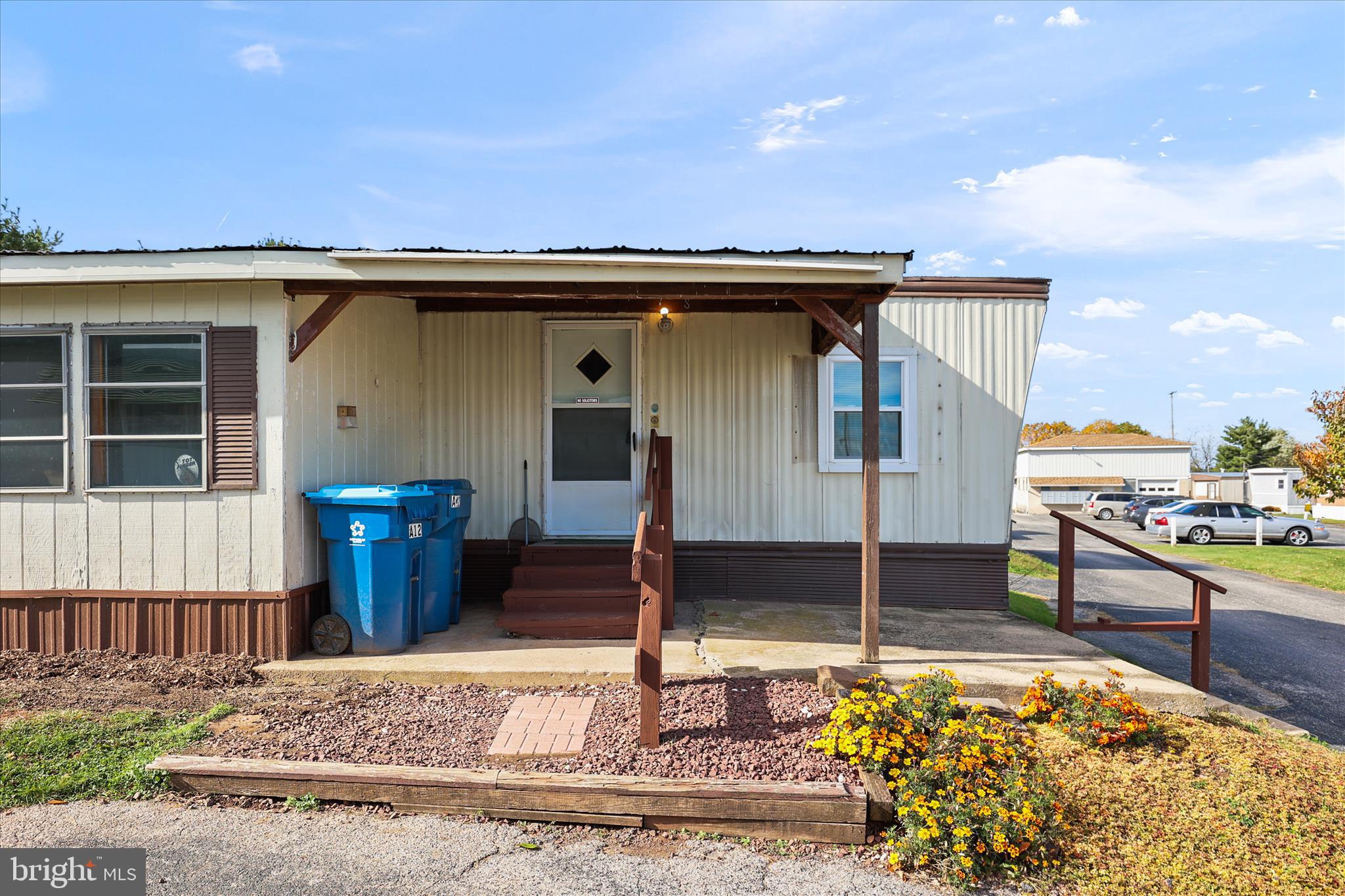 3720 Davidsburg Road, Unit A12 Dover, PA 17315 - Photo 4 of 32 a view of a terrace with chairs