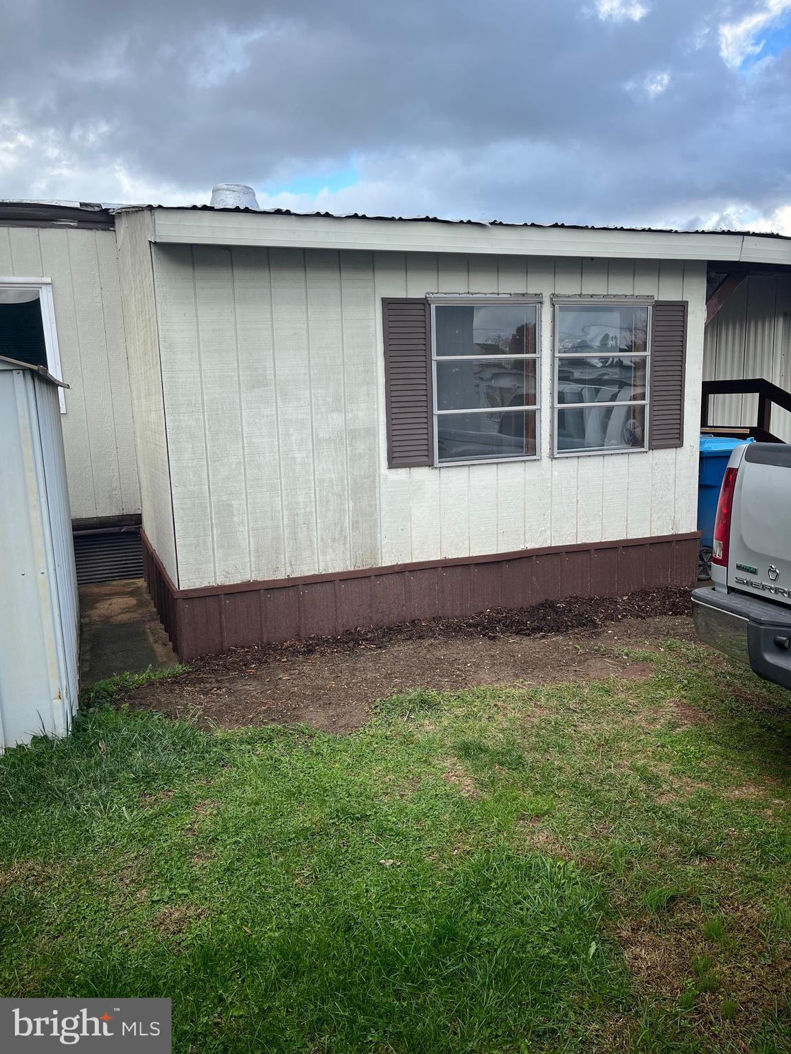 3720 Davidsburg Road, Unit A12 Dover, PA 17315 - Photo 7 of 32 a front view of a house with a yard