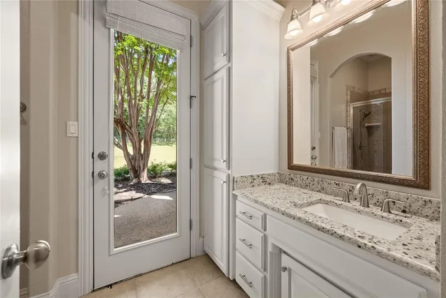 an aerial view of residential house with outdoor space