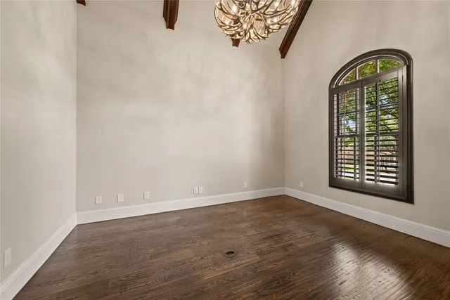 a living room with furniture fireplace and window