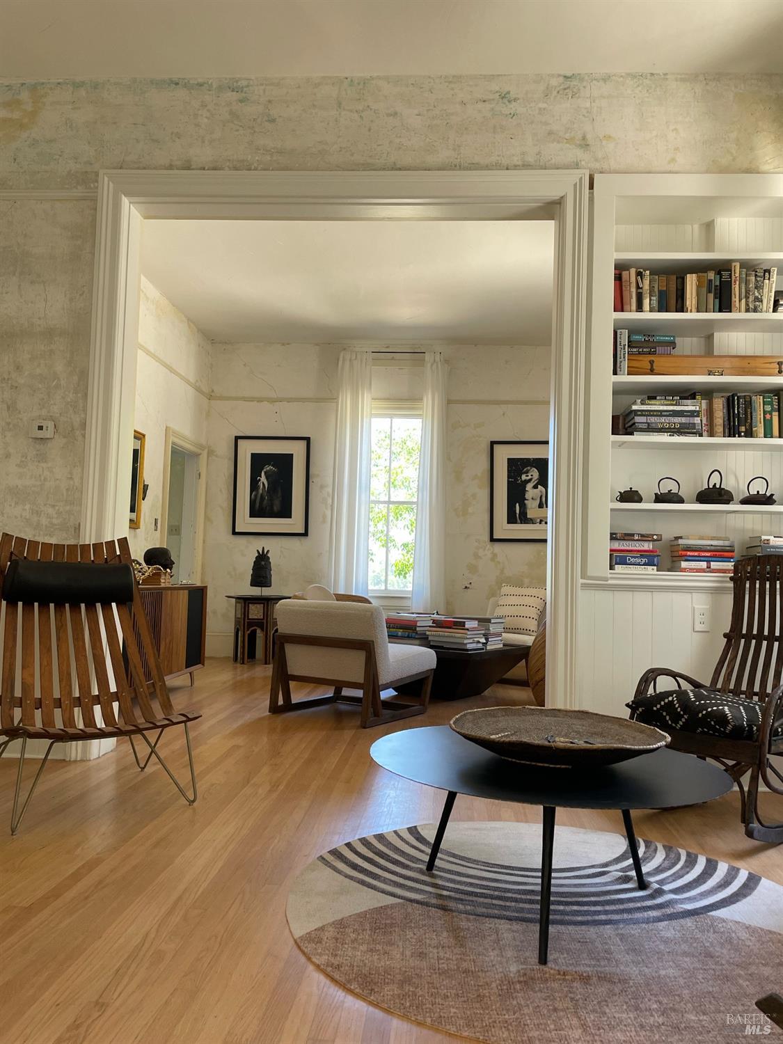 751 Crystal Springs Road St. Helena, CA 94574 - Photo 12 of 25 a living room with furniture and a table