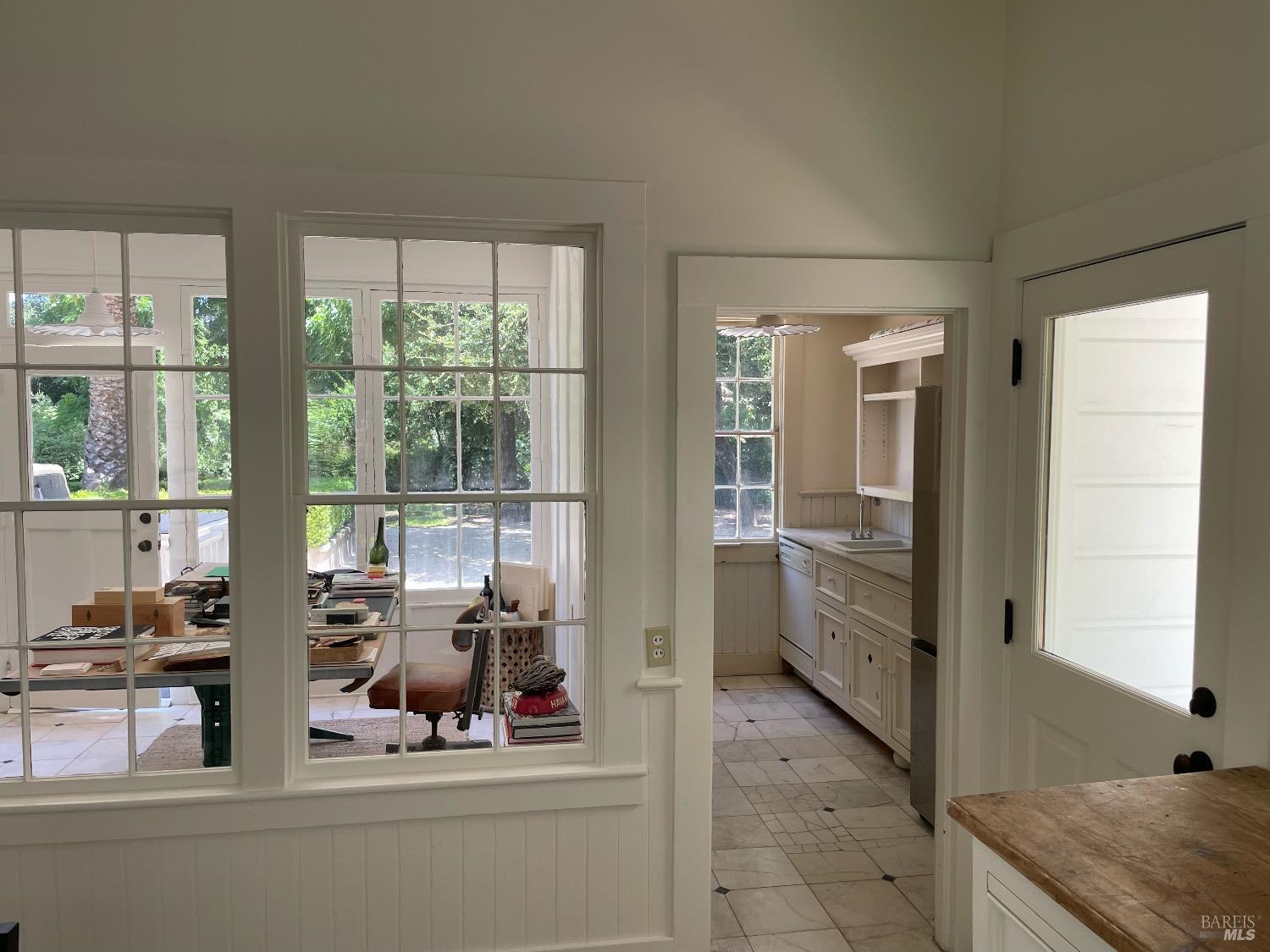 751 Crystal Springs Road St. Helena, CA 94574 - Photo 13 of 25 a bathroom with a sink and a large mirror