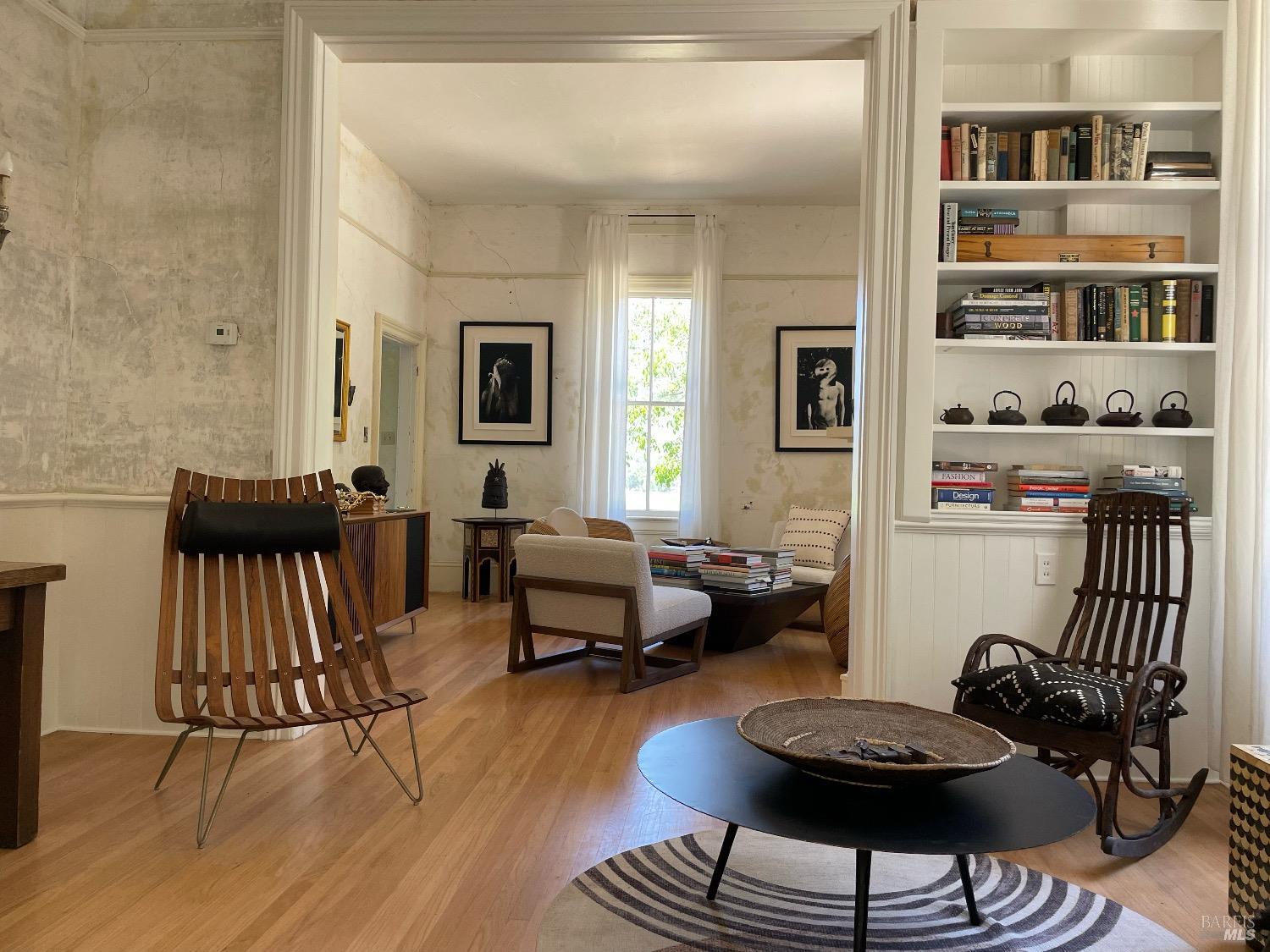 751 Crystal Springs Road St. Helena, CA 94574 - Photo 18 of 25 a living room with furniture and a wooden floor
