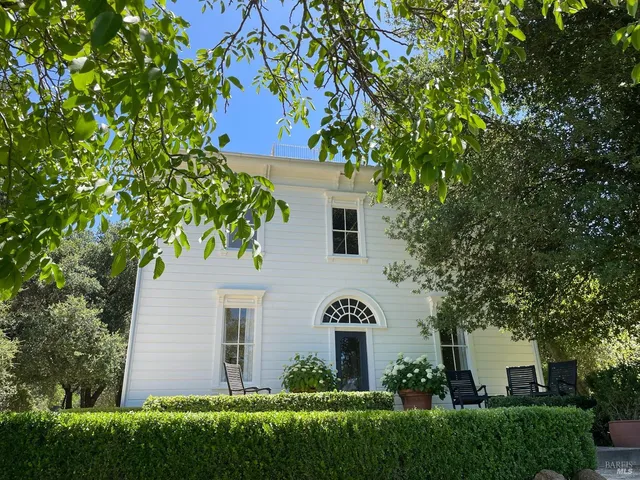 a view of a yard with an trees
