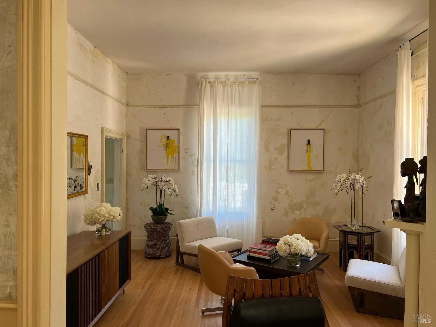 751 Crystal Springs Road St. Helena, CA 94574 - Photo 4 of 25 a living room with furniture and wooden floor