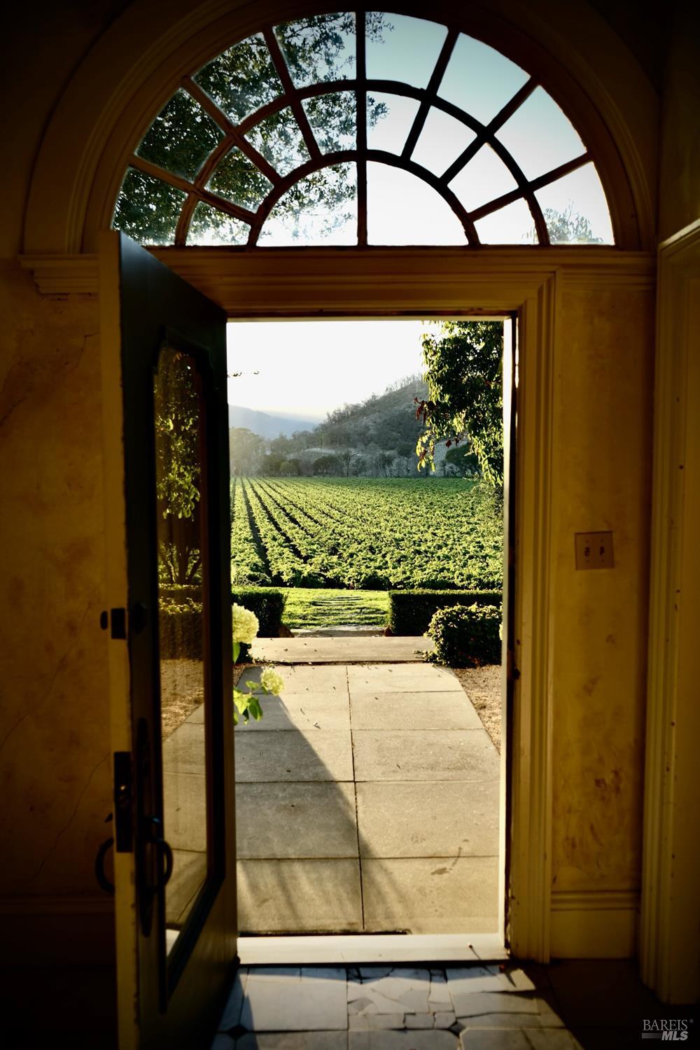 751 Crystal Springs Road St. Helena, CA 94574 - Photo 6 of 25 a view of a glass door with a balcony from a room
