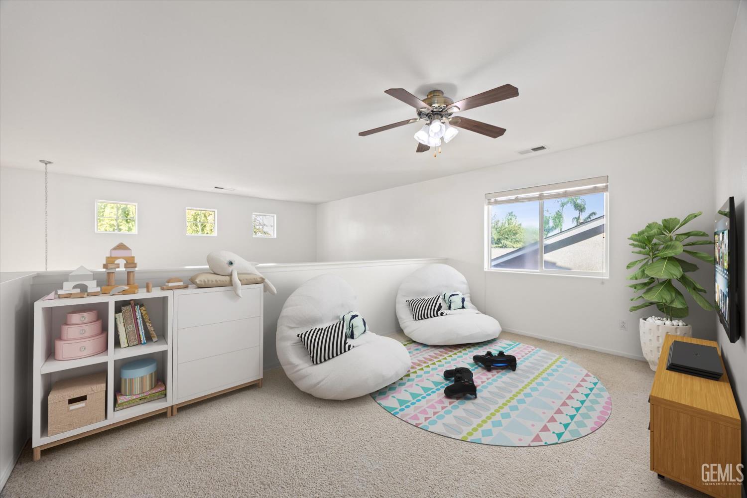 Undisclosed Address Bakersfield, CA 93312 - Photo 20 of 42 a living room with furniture and a chandelier