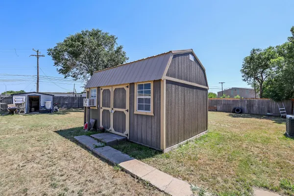 a house view with a outdoor space