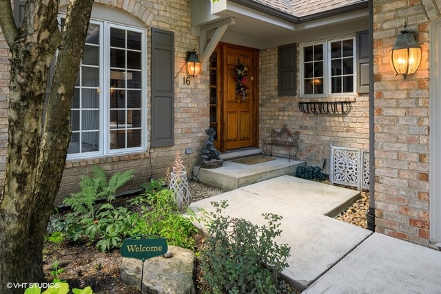16 Tartan Ridge Road Burr Ridge, IL 60527 - Photo 2 of 30 front view of a brick house with a large windows