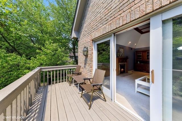 16 Tartan Ridge Road Burr Ridge, IL 60527 - Photo 9 of 30 a view of balcony with chairs and wooden fence