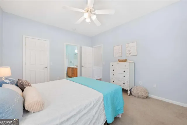 a bedroom with a bed and a cabinets