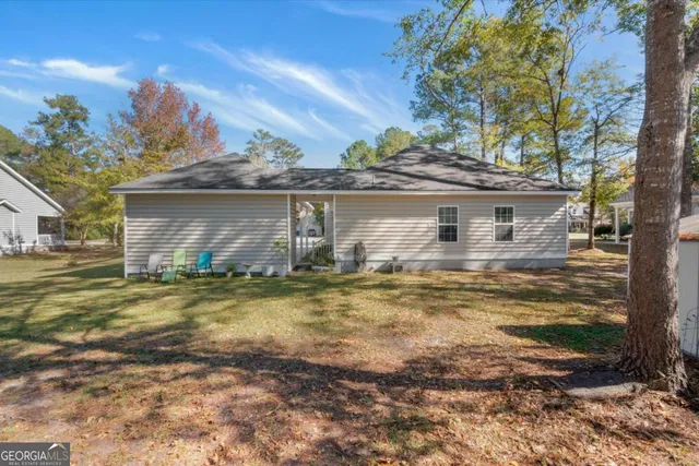 a front view of house with outdoor space