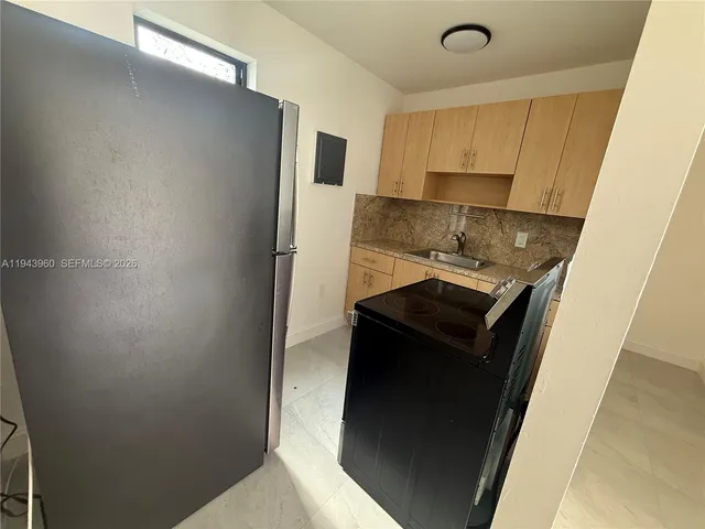 a bathroom with a shower and a toilet