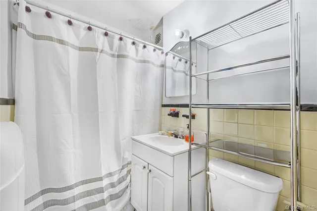 a bedroom with a bed and a window in it