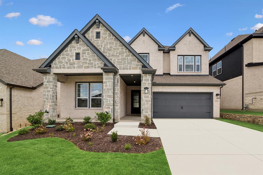 2212 Pika Road Northlake, TX 76247 - Photo 1 of 1 a front view of a house with a yard and garage