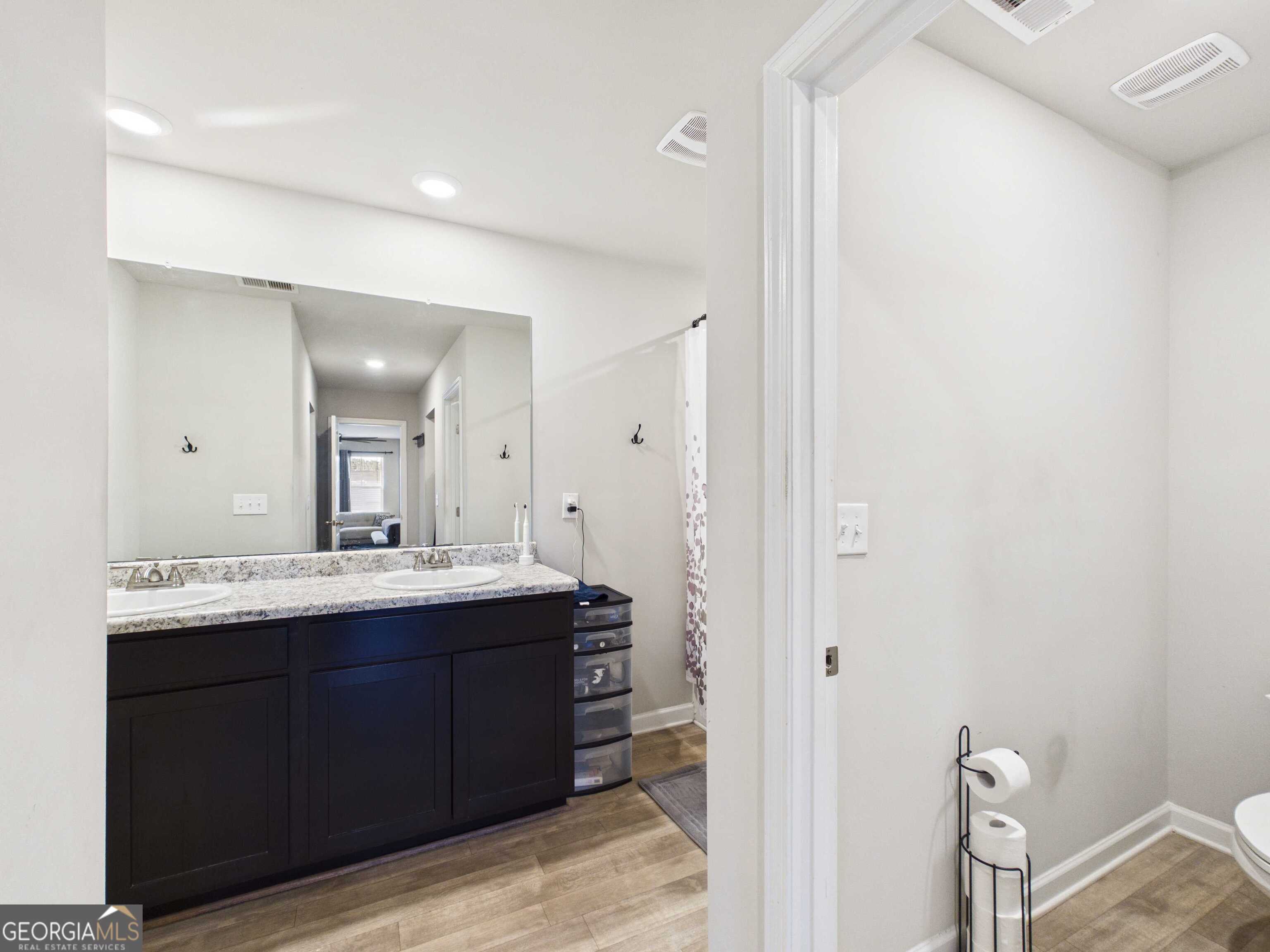 197 Stocks Circle West Point, GA 31833 - Photo 16 of 63 a view of bathroom with a sink and mirror