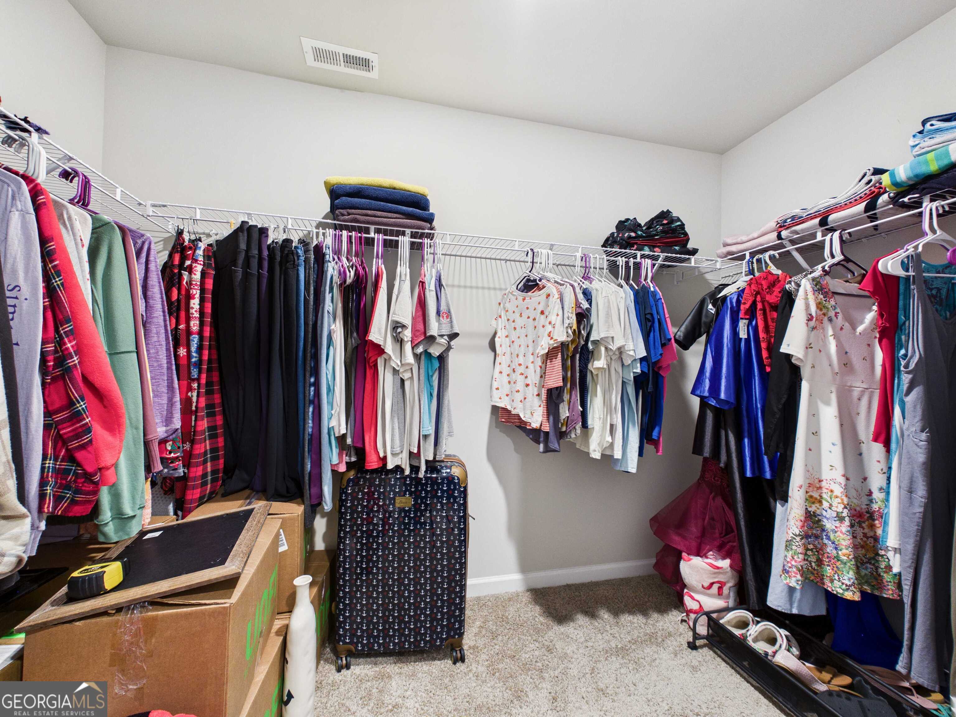 197 Stocks Circle West Point, GA 31833 - Photo 17 of 63 a view of walk in closet with clothes