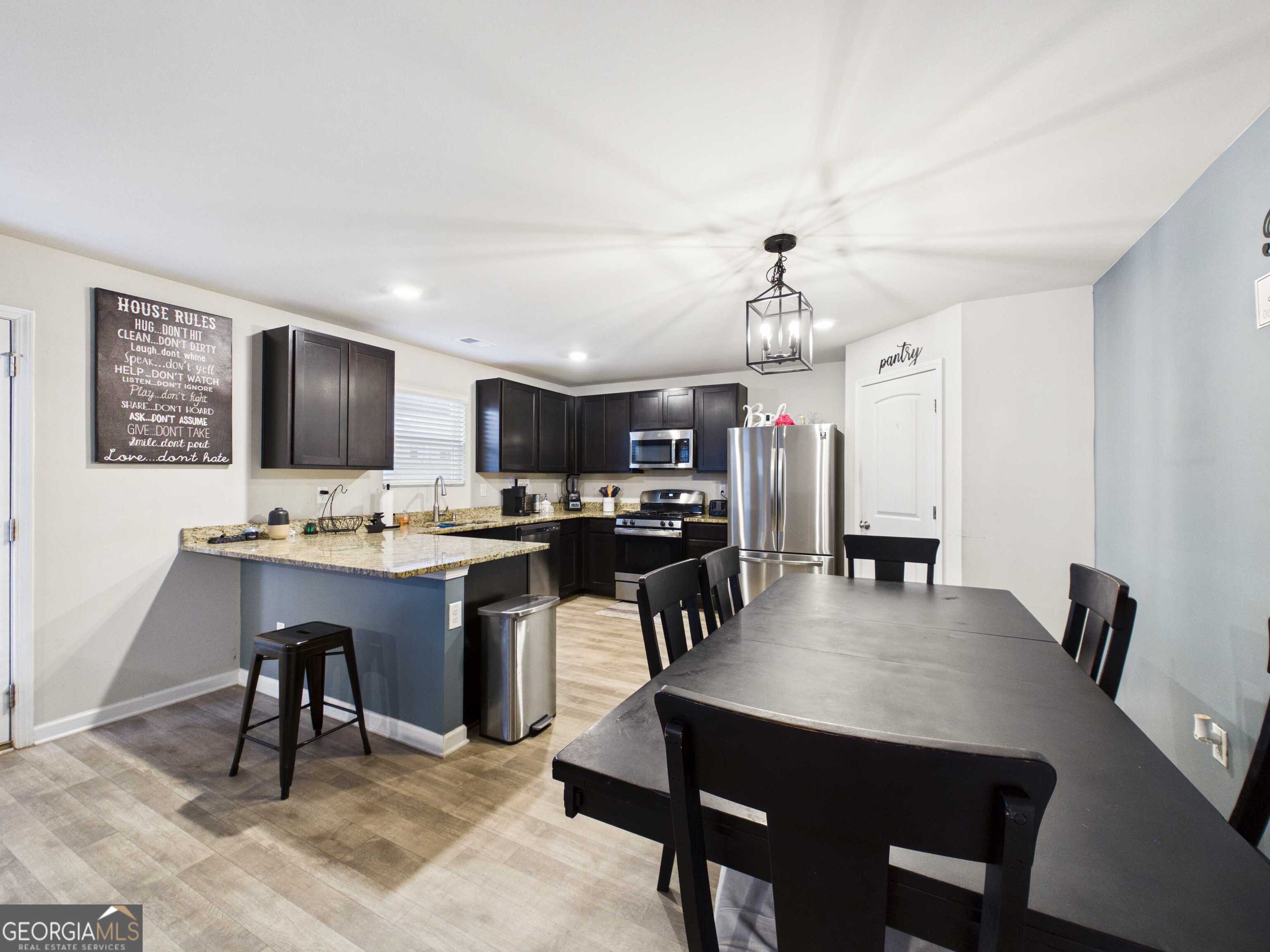 197 Stocks Circle West Point, GA 31833 - Photo 54 of 63 a view of a dining room with furniture