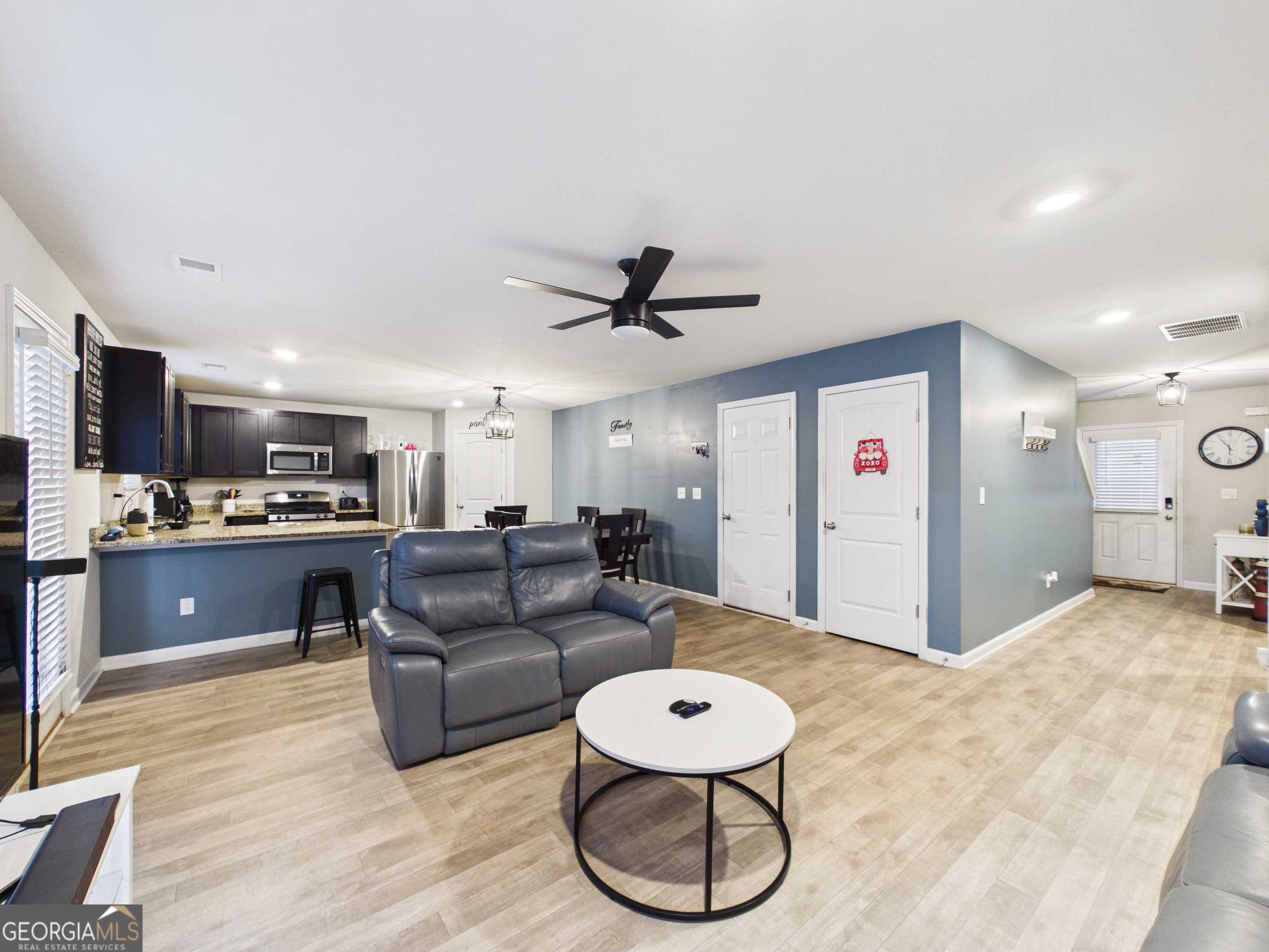 197 Stocks Circle West Point, GA 31833 - Photo 59 of 63 a living room with furniture and kitchen view