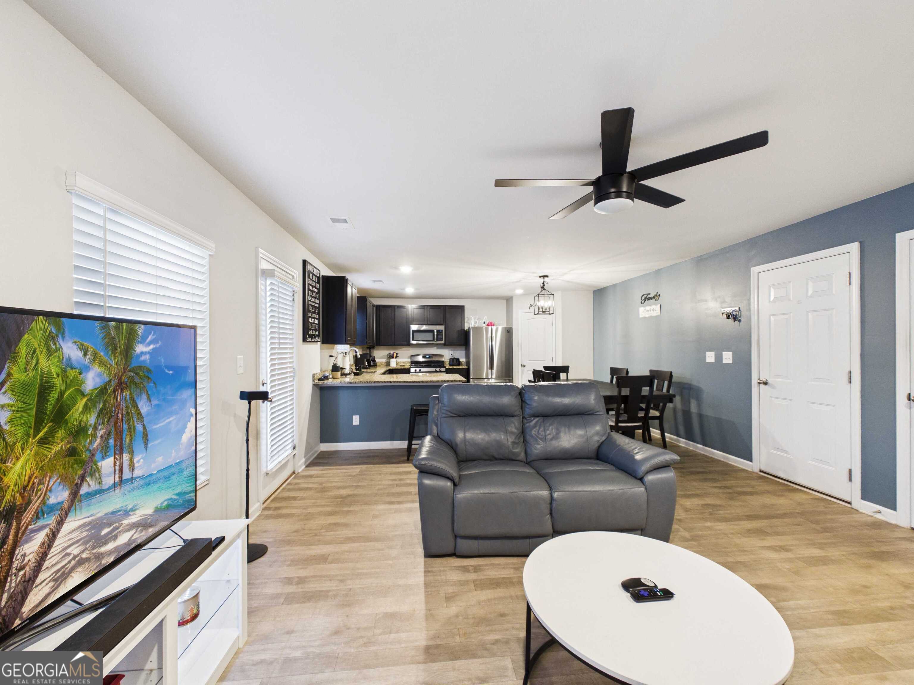 197 Stocks Circle West Point, GA 31833 - Photo 60 of 63 a living room with furniture and a flat screen tv
